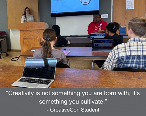Students in a classroom listen to a presentation, with a quote about creativity displayed on the screen.
